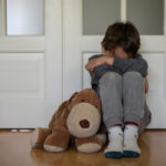 view of a child victim of child abuse